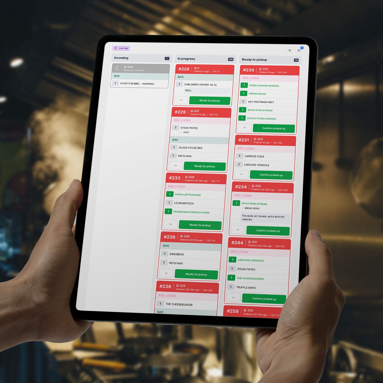 The kitchen display with tickets in a restaurant kitchen